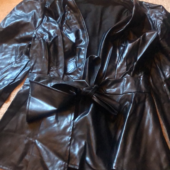 This is a faux leather black peplum rye front top or jacket size Large - Picture 2 of 5